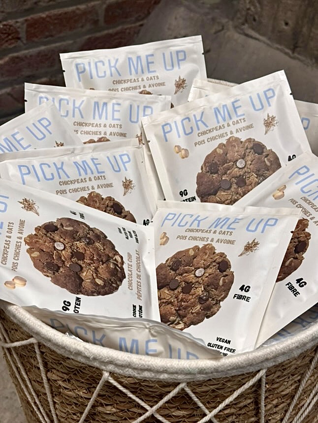 Basket full of Pick Me Up cookie packages